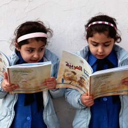 Young girls reading