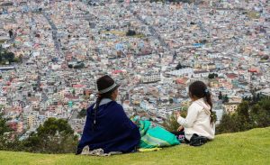 People overlooking Quito from Ecuador