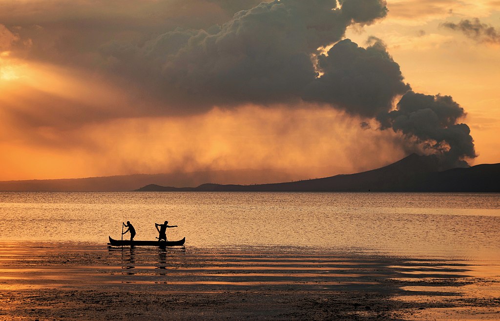 Merely two days after the violent eruption of Taal Volcano in the Philippines, the photographer visits its nearby lake to find locals fishing for tilapia despite imminent danger.