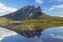 Photograph of Mount Sukakpak in Alaska and it’s reflection in a clear lake.
